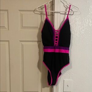 Black One-Piece Swimsuit with Pink Accents